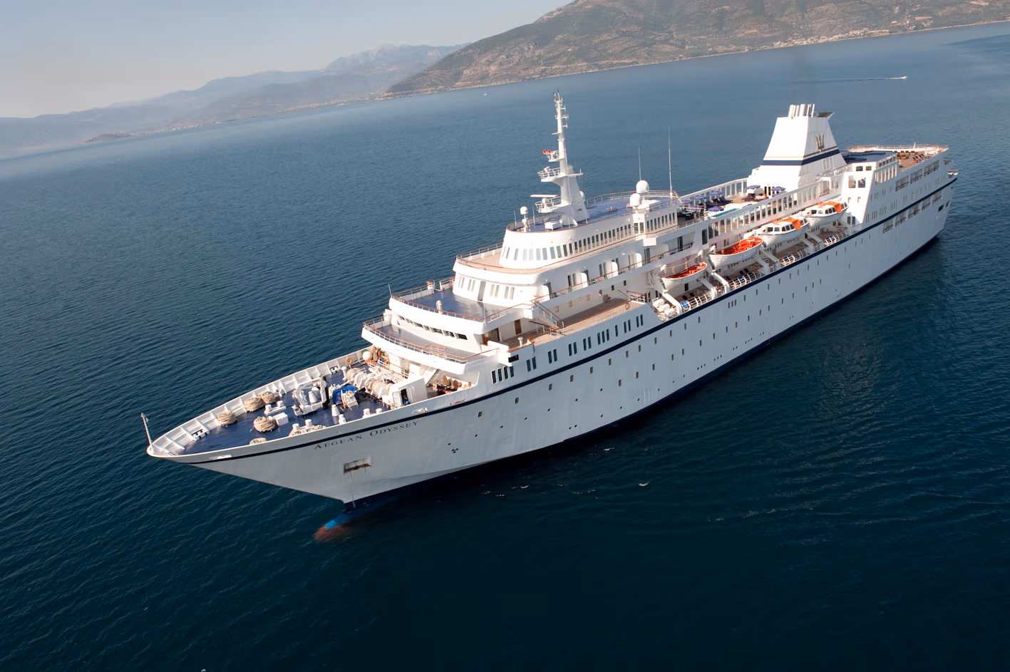 Cruise ship approaching the coast on The Basalt Islands